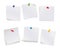 Set of white note papers with different color pushpins