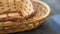 Set of wicker baskets on a dark background.