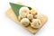 A set of Wild Mushroom in fold Banana leaf on wood cutting board