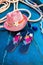 Set of Woman`s Things Accessories to Beach Season Straw Beach Woman`s Hat Top View Blue, turquoise Background Flat Single vertic