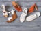 Set of womens shoes flat sandals on  wooden background. Spring summer collection. Flat lay. Fashion concept. Template for online