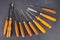 Set of wood chisel for carving wood, sculpture tools on gray background