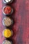 Set of wooden bowls with Indian spices