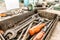 A set of working tools of a repairman`s fitter, open-end wrenches and screwdrivers are in a metal box during the repair process