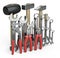 A set of your locksmith tools - ax, chisel, chisel, pliers, mallet, hammer, screwdriver, wrench, saw and wire cutters