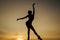 Set yourself free. Girl silhouette on evening sky. Free dance. My choice is freedom