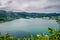 Sete Cidades and its twin lagoons, green and blue with fog in the mountains, São Miguel - Azores PORTUGAL