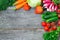 Sets with organic vegetables on a wooden background.Copy space b