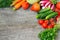 Sets with organic vegetables on a wooden background.Copy space b