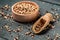 Sets quinoa seeds on a wooden bowl. Healthy and diet superfood product. Food recipe background. Close up