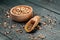 Sets quinoa seeds on a wooden bowl. Healthy and diet superfood product. Long banner format, top view