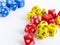 Sets of yellow, blue and red dices for rpg, dnd or board games on white background