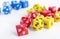 Sets of yellow, blue and red dices for rpg, dnd or board games on white background