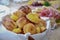 Setting of the table with food for breakfast, bread, beverage, shallow focus, cafe, buffet, backer