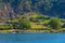 Settlement alongside lake Koman in Albania