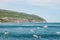 SetÃºbal, PORTUGAL - June 10, 2021 - Several recreational boats with people on vacation in Portinho da ArrÃ¡bida