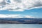 Sevan lake and white clouds blue sky on a sunny day, Armenia