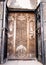 Sevan peninsula. Armenia-May, 01 2019: Carved wooden door of Sourp Arakelots, Sevanavank monastery, Armenia