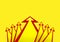 Seven arrows with red stroke on yellow background