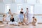 The seven ballerinas at ballet bar