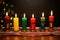 seven lit front view kwanzaa candles
