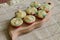 Seven muffins on wood cutting board