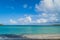 Seven Sea beach in tropical Fajardo Puerto Rico and white puffy clouds