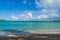 Seven Sea beach in tropical Fajardo Puerto Rico and white puffy clouds