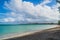 Seven Sea beach in tropical Fajardo Puerto Rico and white puffy clouds