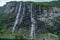 Seven sisters waterfall in geirangerfjord, norway seen from a cruise ship