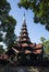 Seven-tiered spire of Bagaya Monastery - teak wood buddhist monastery in Inwa Ava, Myanmar