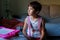 Seven years old girl ready to go to school with backpack