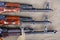 several ak 47 on canvas with ammunitions on canvas