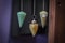 Several Beautiful Crystal Pendulums Hanging on Display