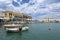 Several boats and a lively crowd at the restaurants in the harbor of the old town in Rethimno, Crete, Greece