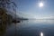 Several boats stand near the shore on Lake Leman