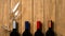 Several bottles of wine on wooden background. Top view with copy space