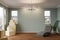 Several Cardboard Moving Boxes, Chair and Plant on Floor of Empty Room of House with Blank Wall