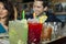 Several cocktails on the bar counter