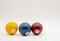 Several colorful bright billiard balls on a white background