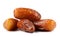 Several delicious dried dates are isolated on a white background. Full clipping path