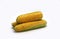 Several ears of corn on a light background. Natural product. Natural structure. Natural color. Close-up