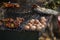 Several eggs are placed on a wire rack. Grilled street food in Thailand makes