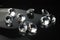 Several excellent pure diamonds with reflection on black mirror background close up view selective focus. Jewelry diamonds sale,