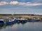 Several fishing boats moored in the harbour at Seahouses on the Northumberland coast in the north east of England
