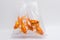 Several Goldfish in plastic bag isolated on white background