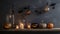 Several halloween pumpkins and candles on a dark shelf