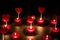 Several hearts and red candles. Concept of love