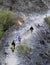 Several Hikers on Desert Trail