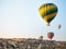 Several hot air balloons rising over Cappadocia